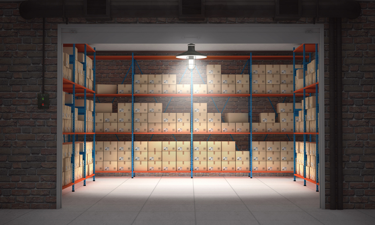 Self storage unit full of cardboard boxes. 3d rendering