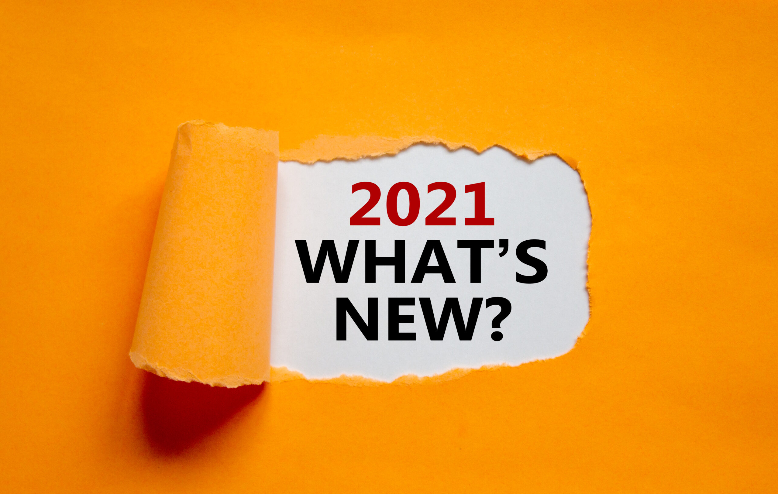 2021 What Is New Symbol. The Words '2021 What Is New' Appearing Behind Torn Orange Paper. Business And 2021 What Is New Concept. Copy Space.